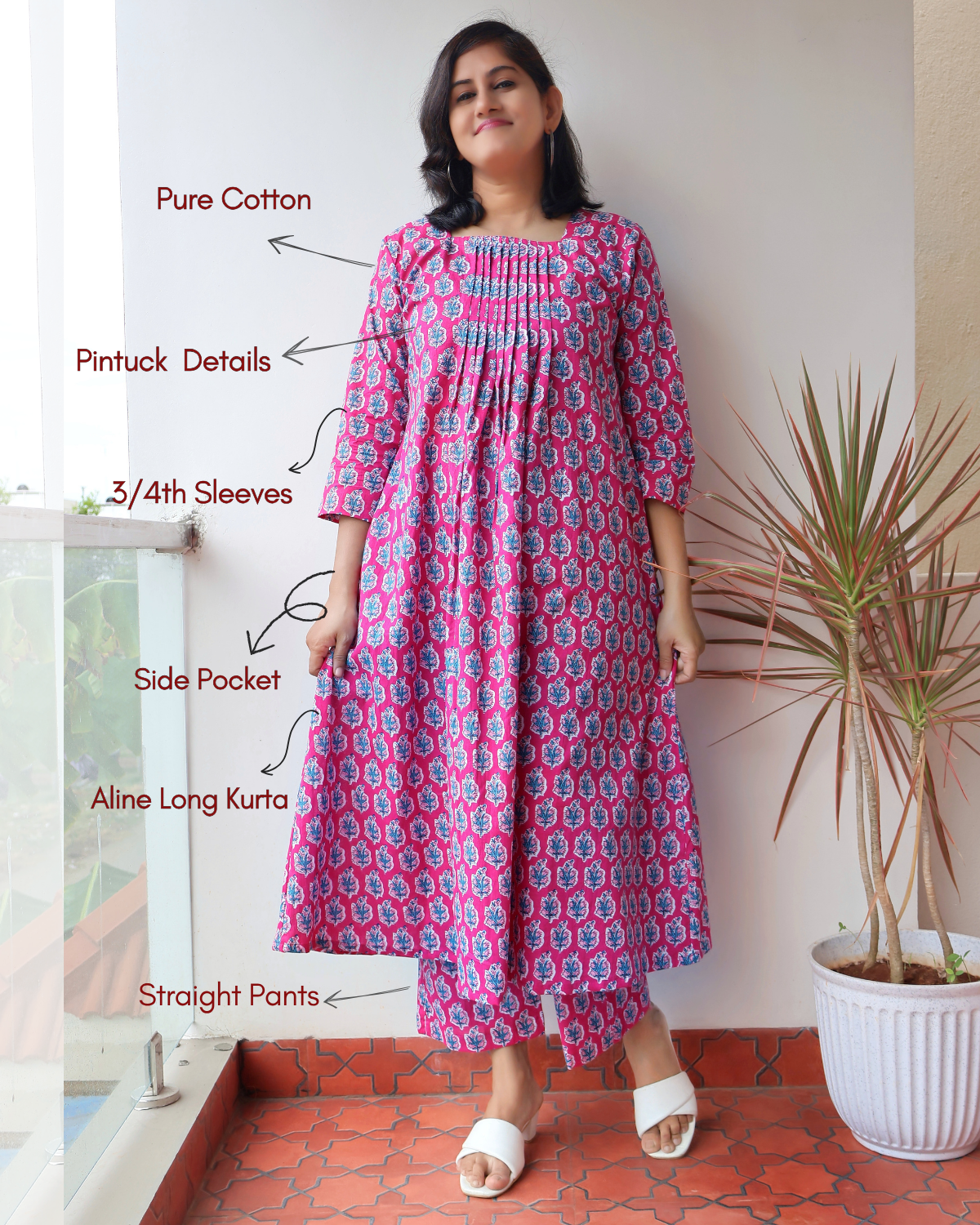 Pink Cotton Kurta Set with Pintuck details, floral prints, 3/4th Sleeves, Side Pocket, flattering Aline kurta with matching straight Cotton Pants.