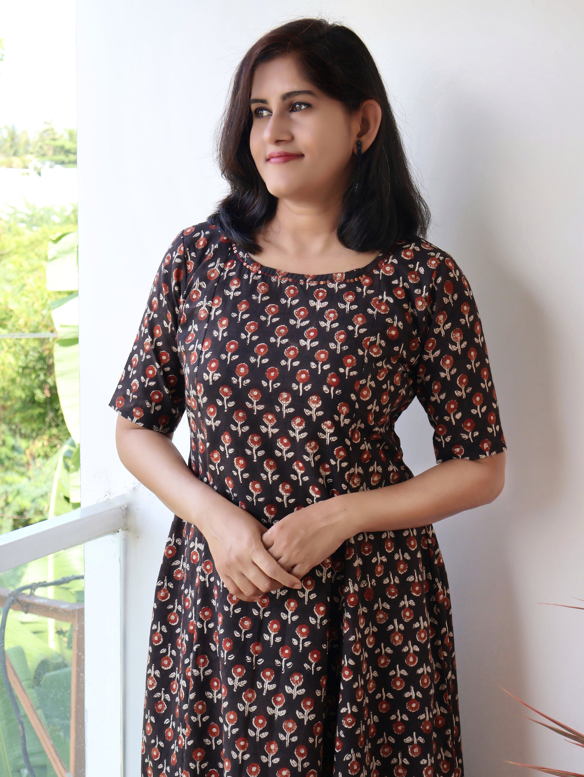 Women wearing black natural dyed Bagru print kurta with sequins