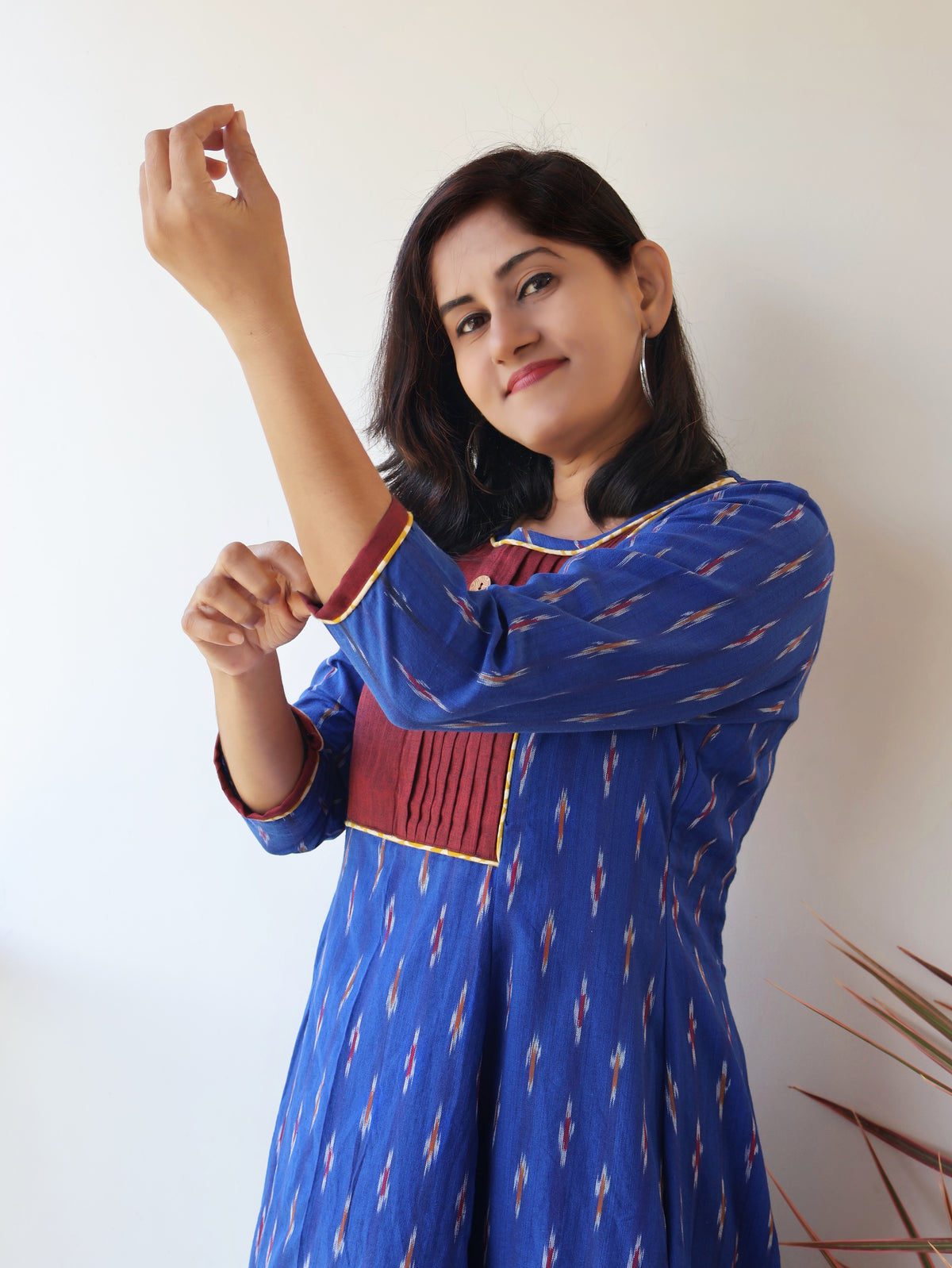 Women wearing Elegant Blue Handloom Kurta with Pintuck Yoke