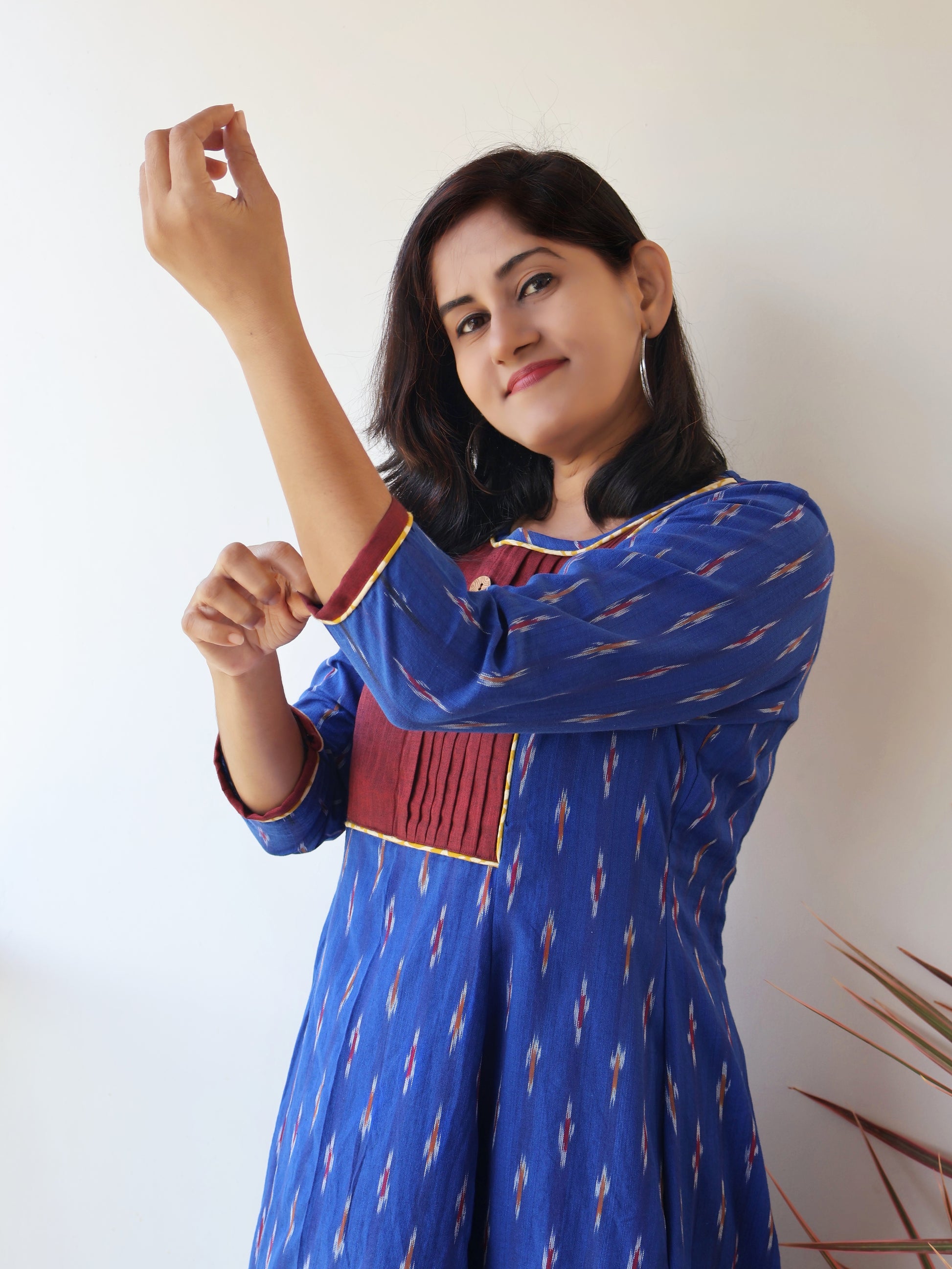 Women wearing Elegant Blue Handloom Kurta with Pintuck Yoke