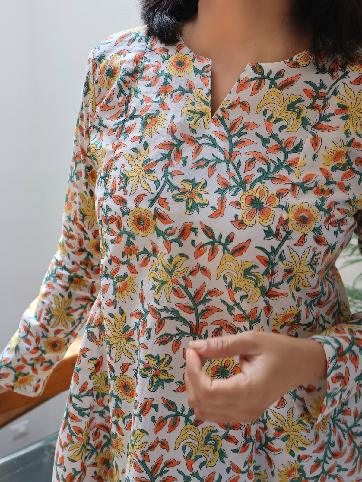 women wearing white floral pure cotton short top panel style full sleeve 