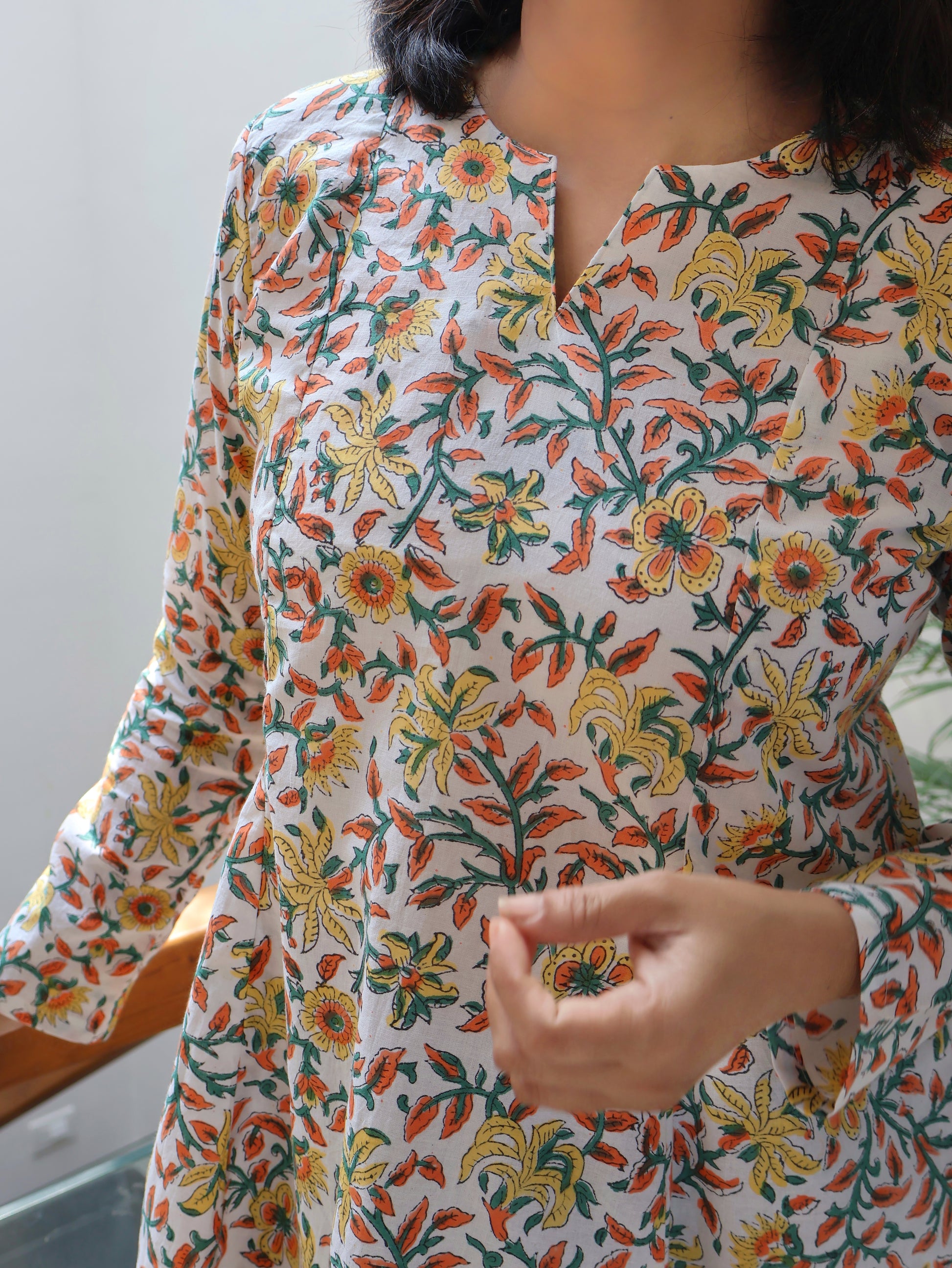 women wearing white floral pure cotton short top panel style full sleeve 