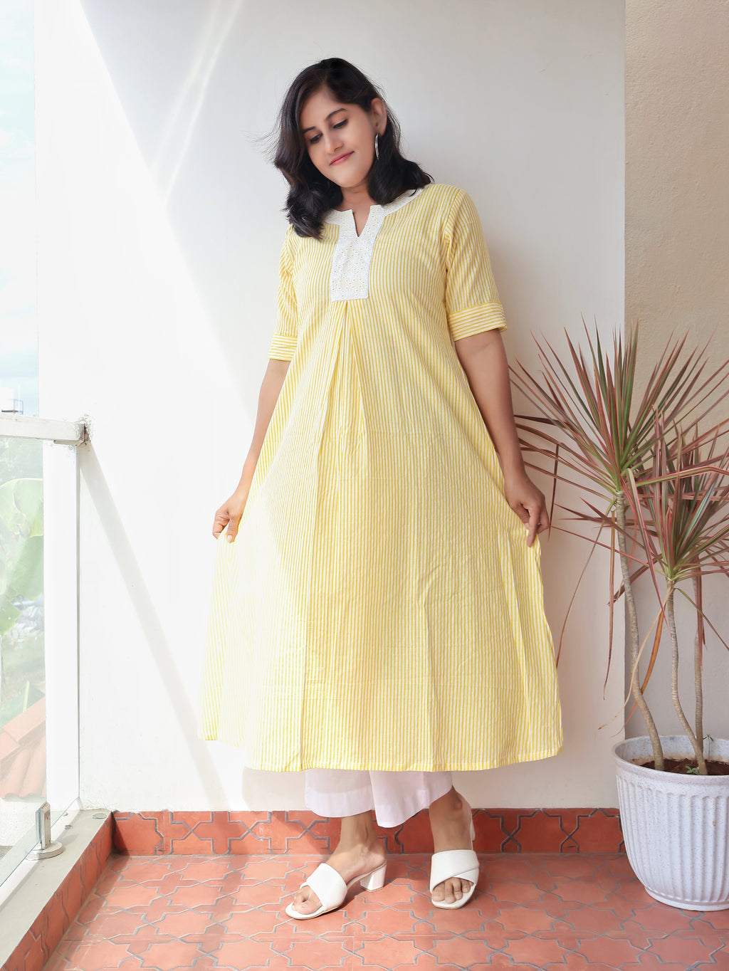 Pure cotton yellow A-line kurta with handcrafted Hakoba detailing