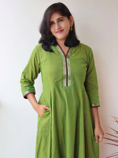 Tulsi Green Handloom Cotton Kurta with collar V-neck contrast trims and zari detailing, pocket 