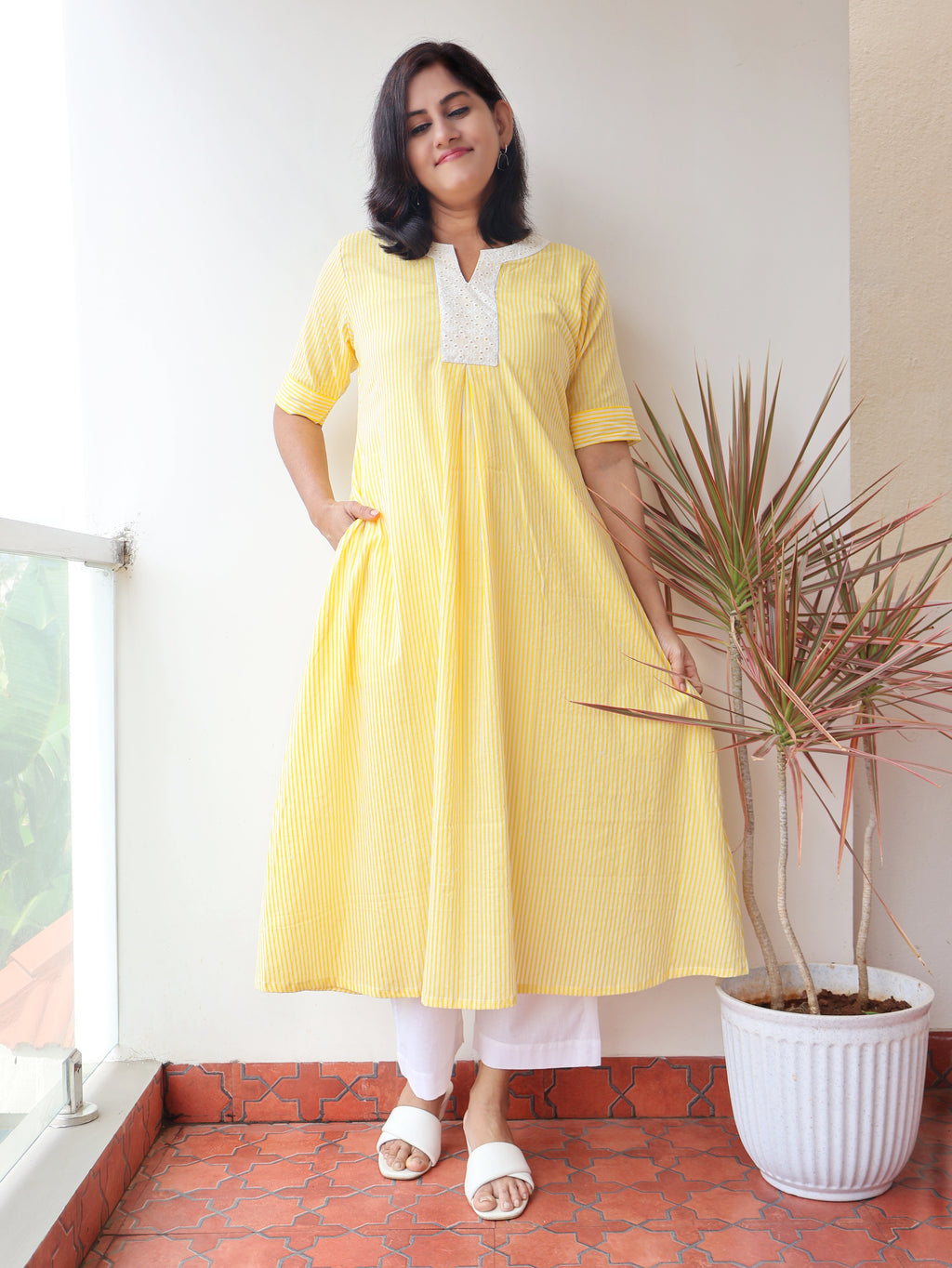 Hello Yellow Sunlight printed cotton A-line kurta with Hakoba yoke and pin stripes