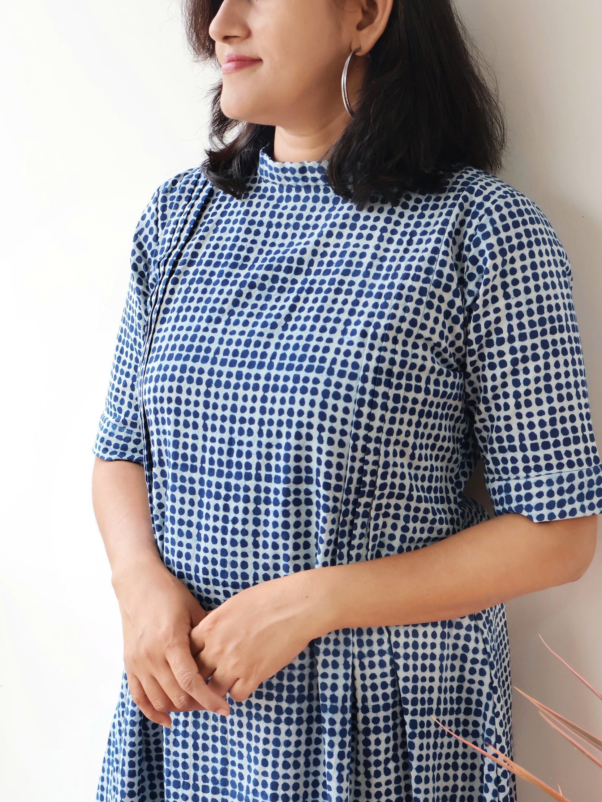 Close-up of dotted hand block print in natural indigo on pure cotton fabric