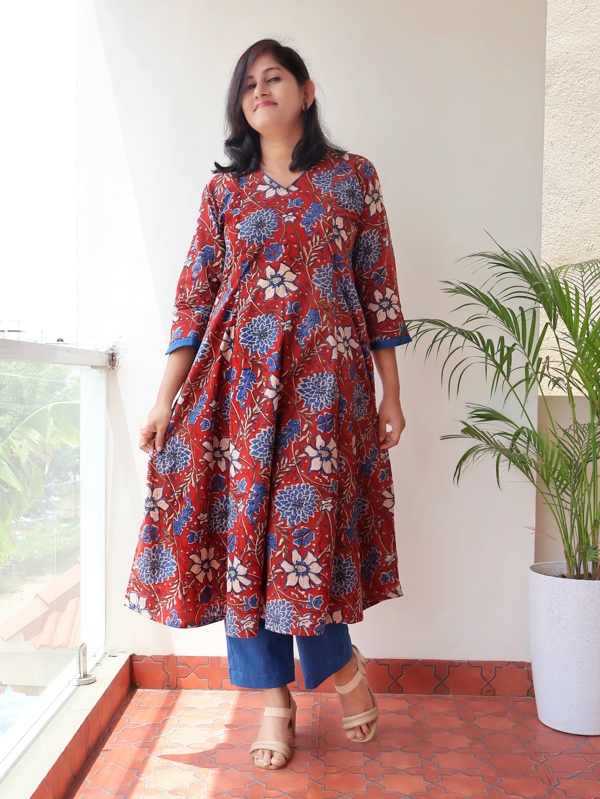 Red blue Bagru hand block cotton kurta with paneled A-line silhouette, curved V-neck, handwoven piping and 3/4 sleeves