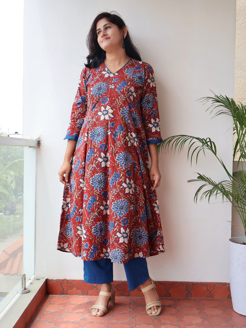 Red blue Bagru hand block cotton kurta with paneled A-line silhouette, curved V-neck, handwoven piping and 3/4 sleeves