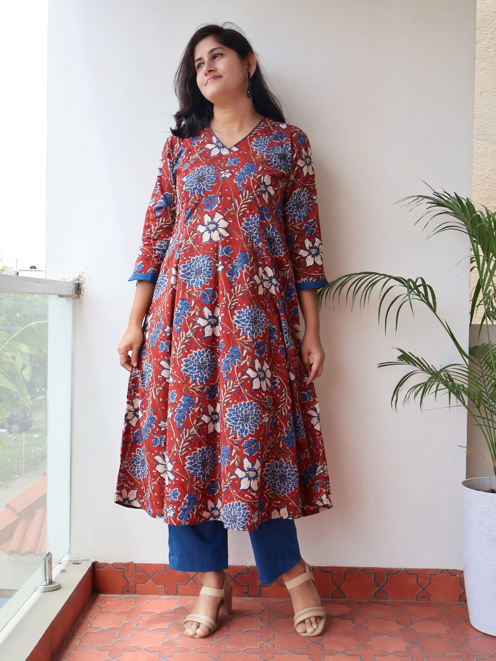 Red blue Bagru hand block cotton kurta with paneled A-line silhouette, curved V-neck, handwoven piping and 3/4 sleeves