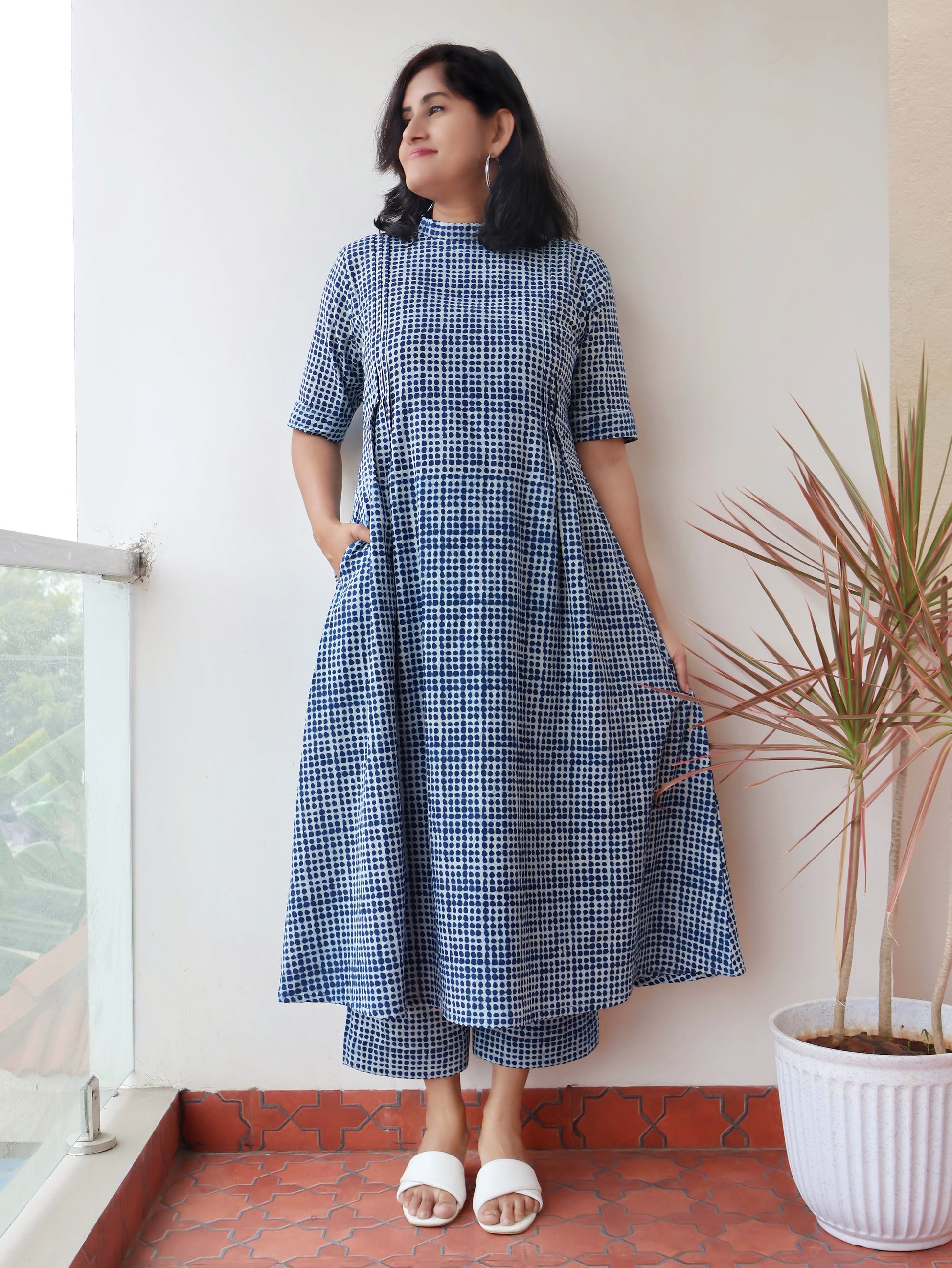 Full-length image of natural indigo pure cotton hand block kurta set styledby women  for everyday wear