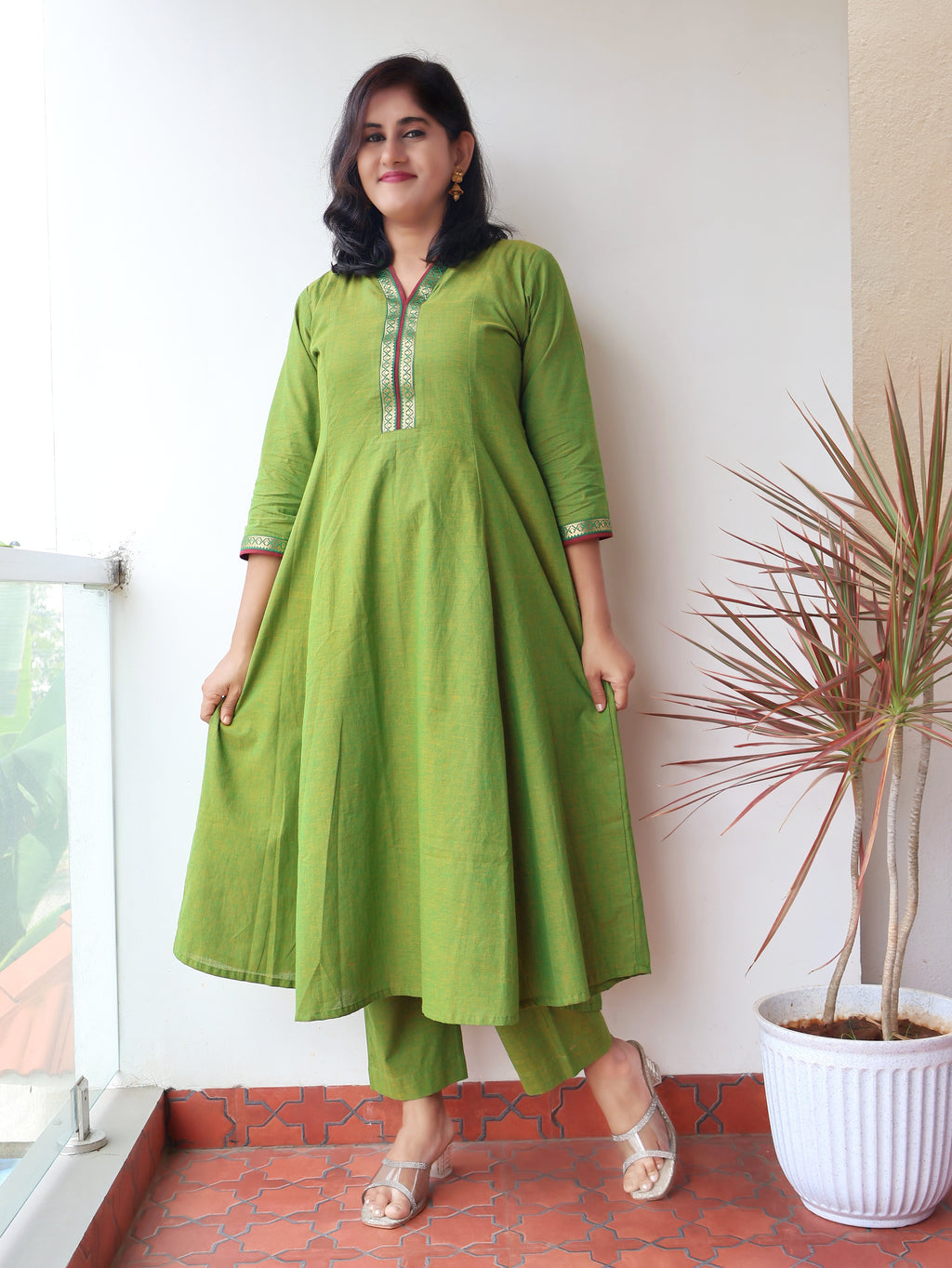Tulsi Green Handloom Cotton Kurta with collar V-neck contrast trims and zari detailing