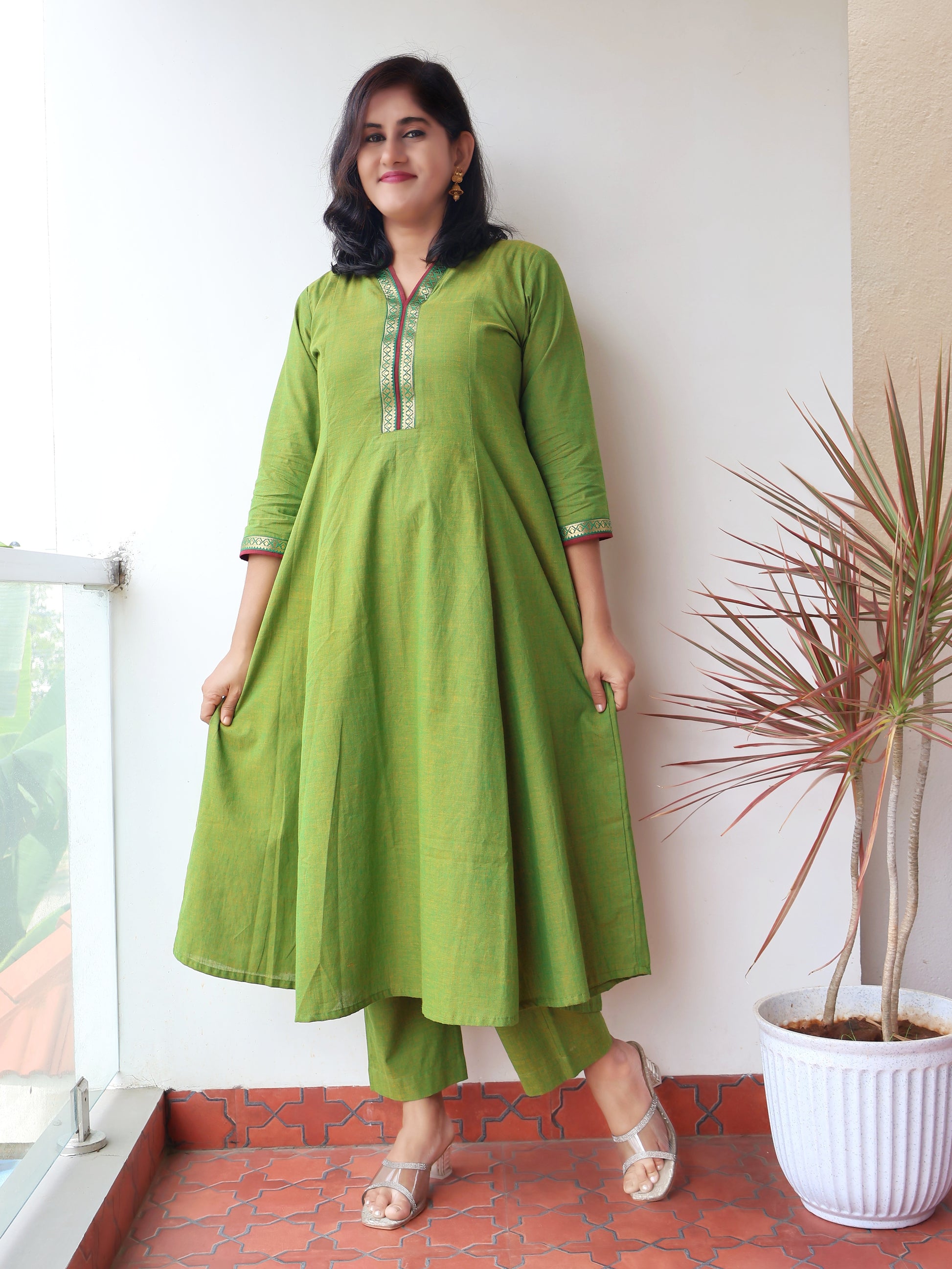 Tulsi Green Handloom Cotton Kurta with collar V-neck contrast trims and zari detailing