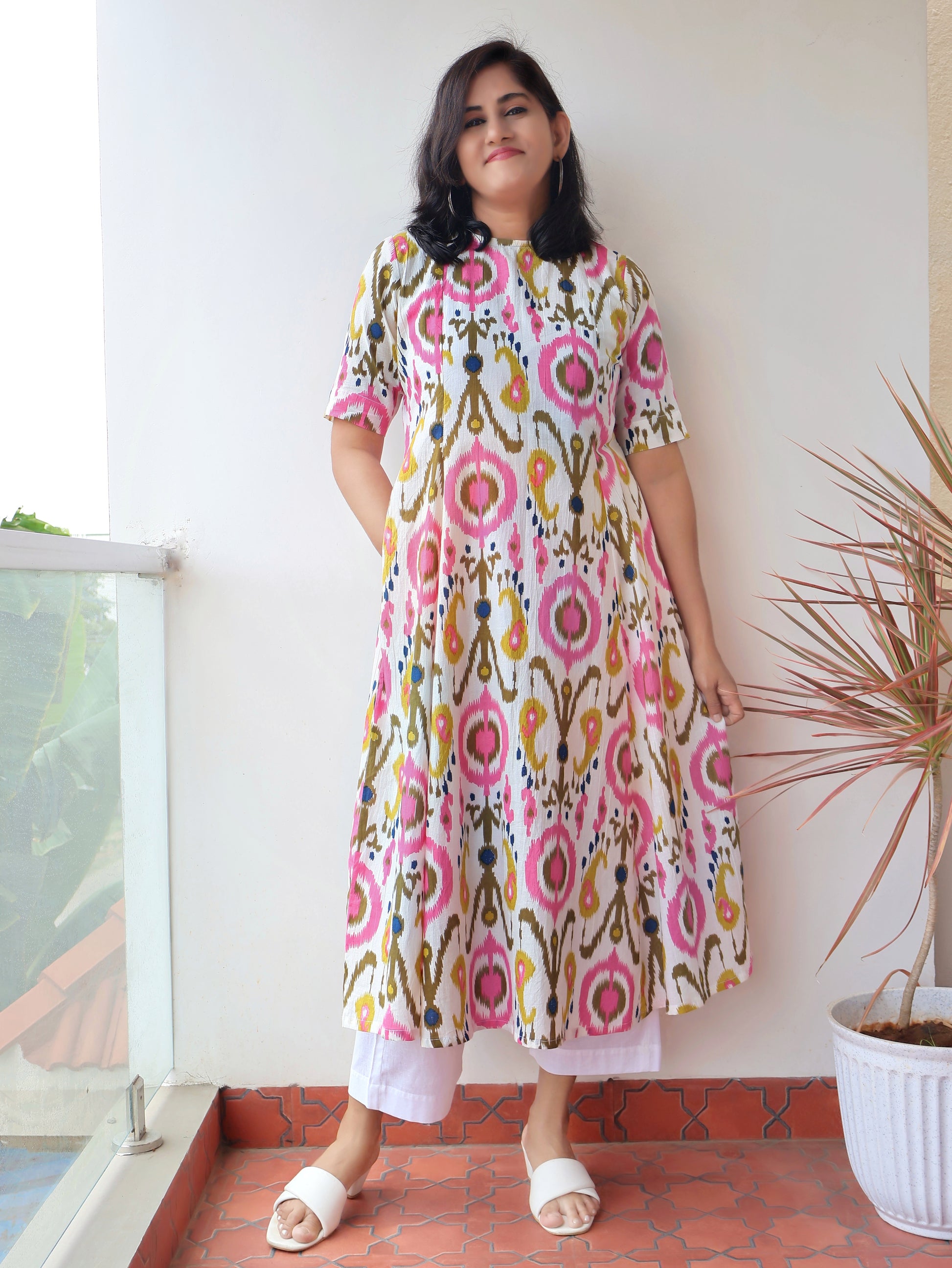 White Pure Cotton Paneled Kurta for Women with Closed Neckline and Back Button Closure