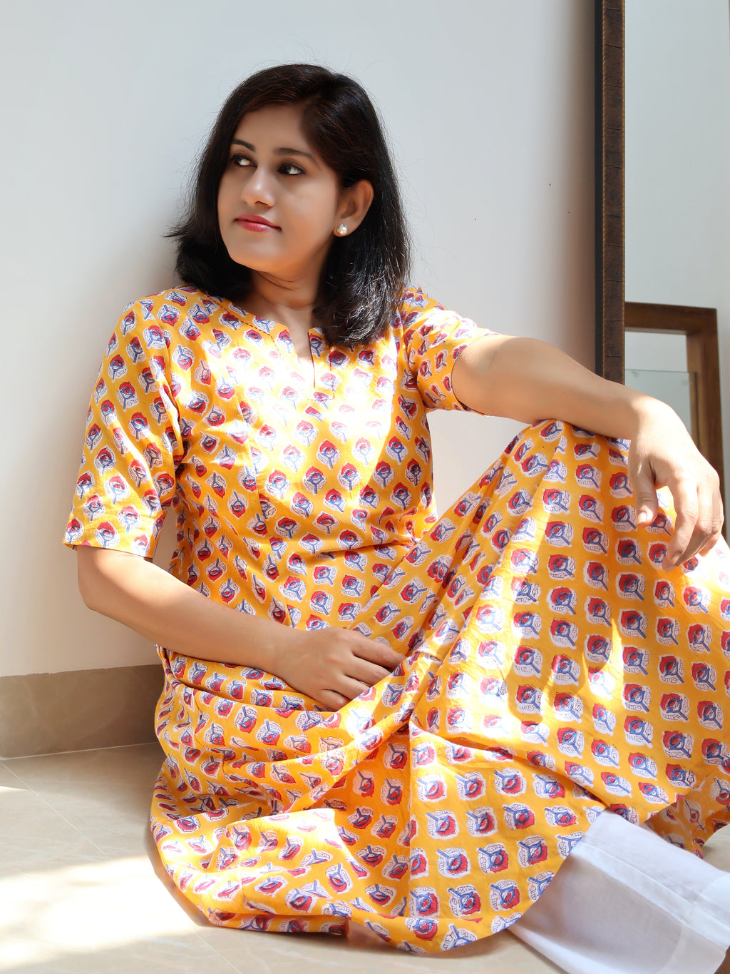 Yellow breathable cotton kurta with Sanganeri hand block print and soft paneled fit